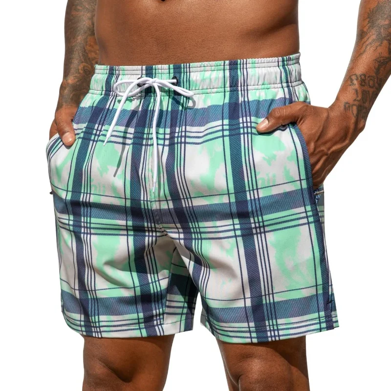 กางเกงว่ายน้ำลายทางไล่เฉดสีทัน - Trunks Board Surf บทวิจารณ์และราคา